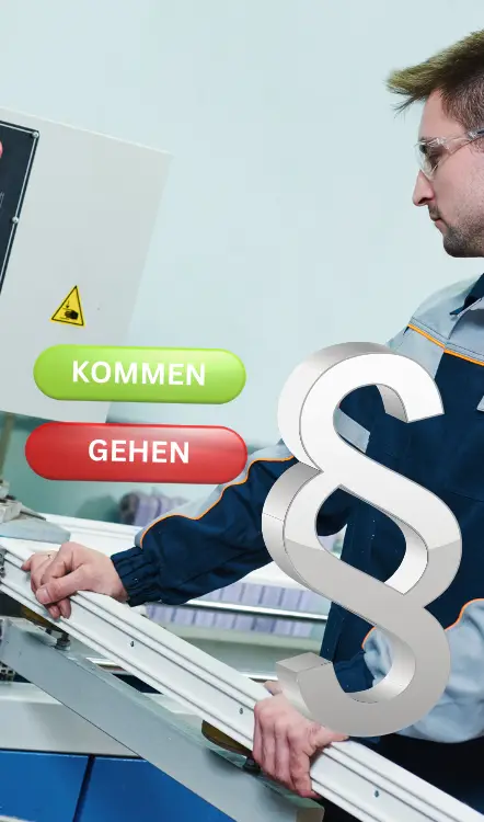 Gesetzbuch und digitales Gerät auf einem Schreibtisch